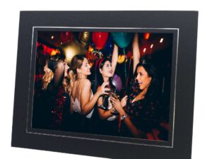 black and silver photo mount with photo of women dancing at a party