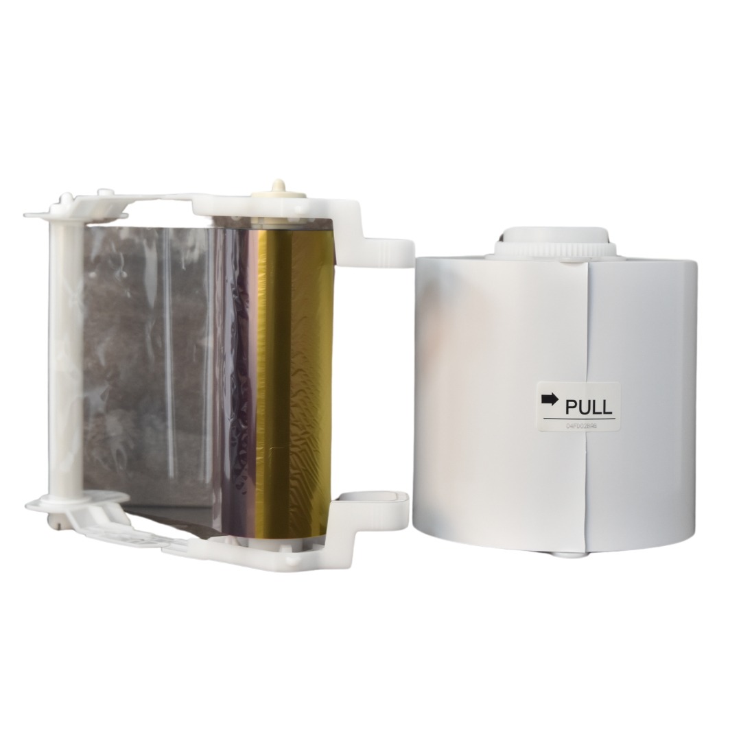 Mitsubishi dye sub media paper roll and ribbon tray.