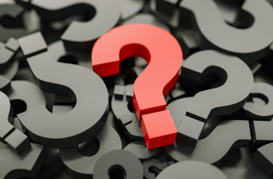 A bunch of black question marks with a red one on top to stand out.